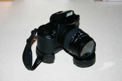 Rebel G with lens and battery pack